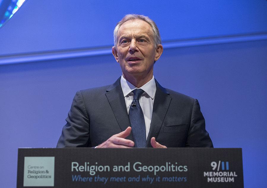 Tony Blair, the former prime minister of Britain, talks at a podium at the 9/11 Memorial Museum.