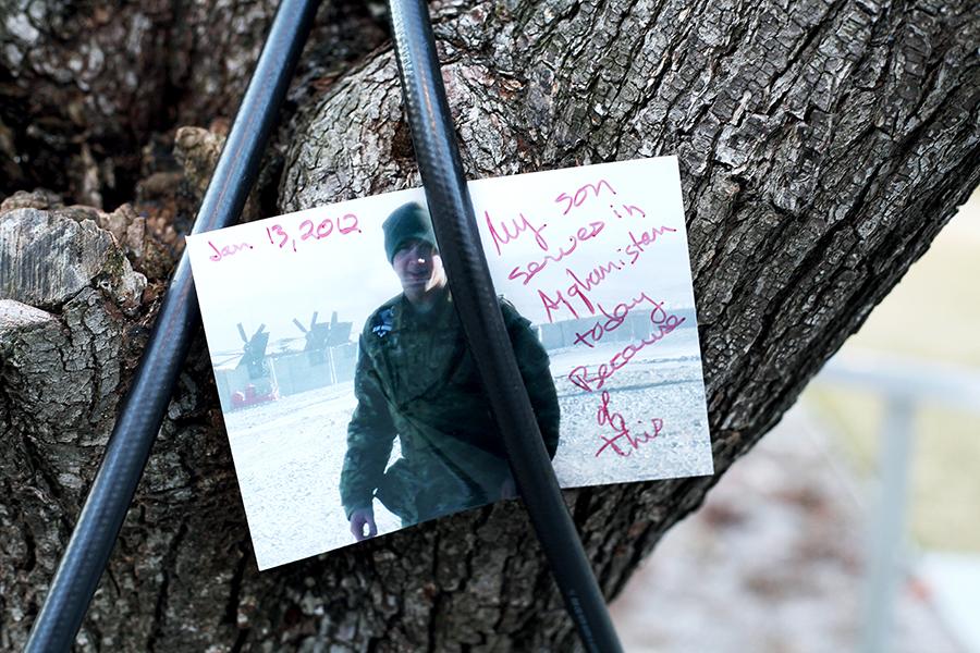 A photo of a U.S. military member has been placed at the Survivor Tree. The photo is dated from January 2012 and includes a message the reads: “My son serves in Afghanistan today because of this.”