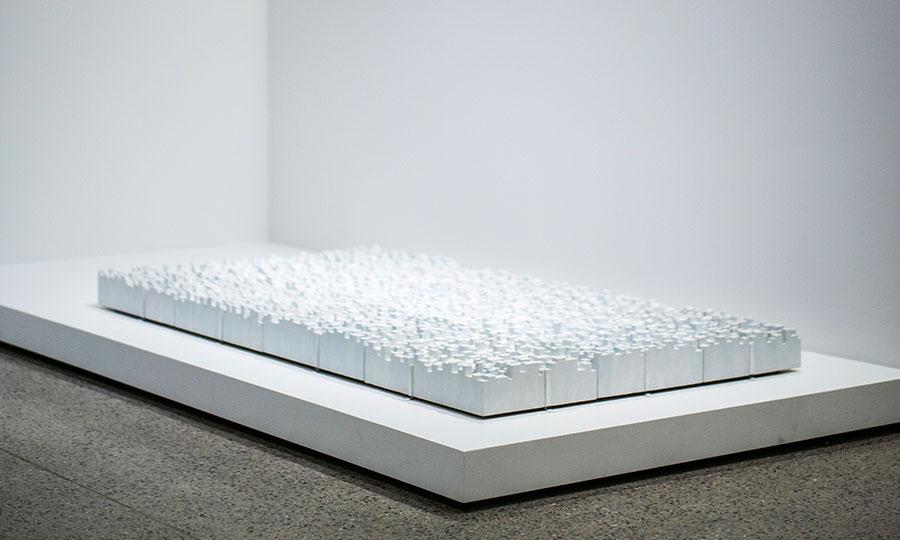 Tobi Kahn’s all-white artwork “M’AHL” is seen on display at the 9/11 Memorial Museum. 