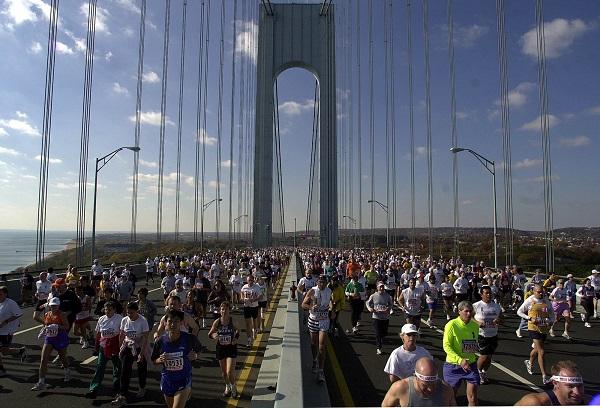 On a sunny day, thousands of runners cross the Verrazzano-Narrows Bridge as part of the 2001 New York City Marathon just weeks after 9/11.