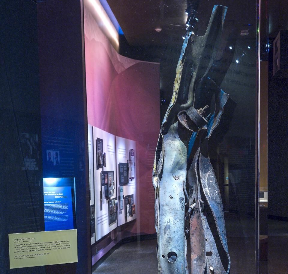 A fragment of the rented van that carried the bomb in the 1993 attack on the World Trade Center is displayed behind glass at the 9/11 Memorial & Museum.