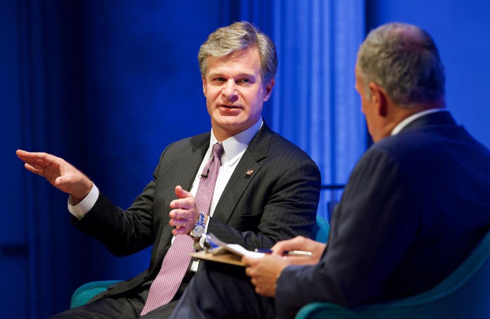 FBI Director Chistopher Wray speaks with Clifford Chanin, executive vice president and deputy director for museum programs, onstage during a public program at the Museum auditorium.