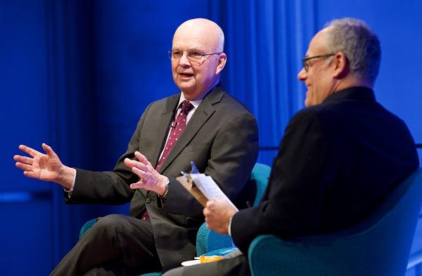 Gen. Michael Hayden gestures as he speaks with Clifford Chanin, executive vice president and deputy director for museum programs, onstage during a public program at the Museum auditorium.