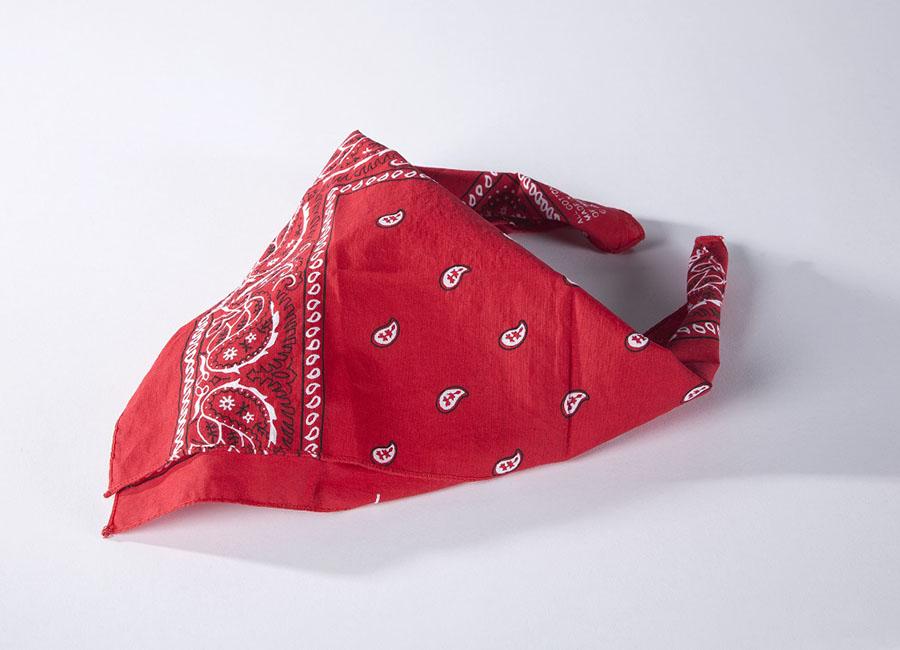 A red bandana that belonged to Welles Crowther is displayed on a white surface at the Museum.