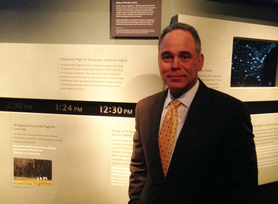 CBS News reporter Jim Axelrod stands in front of the timeline bearing his name at the Museum. Axelrod coined the term “Ground Zero” to refer to the wreckage of the World Trade Center.