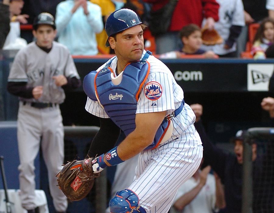 Mets catcher Mike Piazza prepares to throw a ball during a game in September 2001.