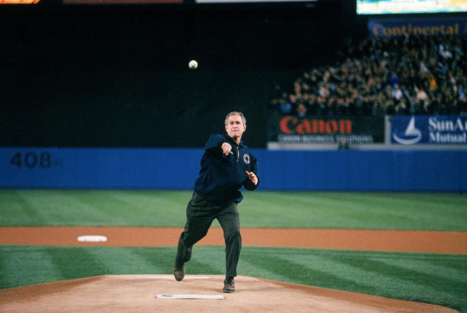 President George W. Bush throws out the ceremonial first pitch during Game Three of the 2001 World Series.