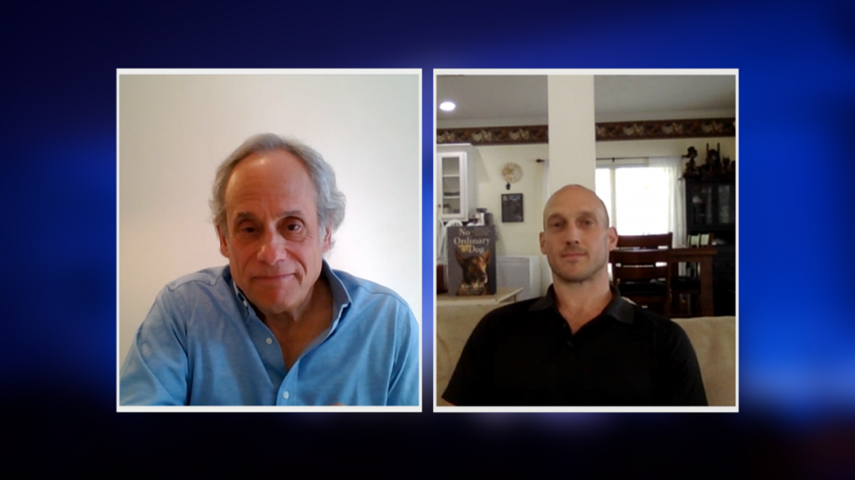 A screenshot of two men engaged in a video chat.