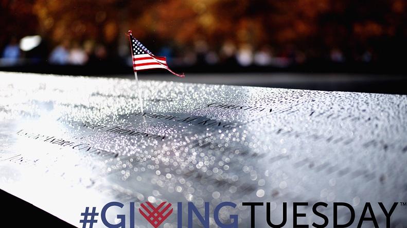 A graphic features a photo of an American flag placed into the Memorial pool with fall foliage in the background. In the bottom right corner "#GivingTuesday" is written.