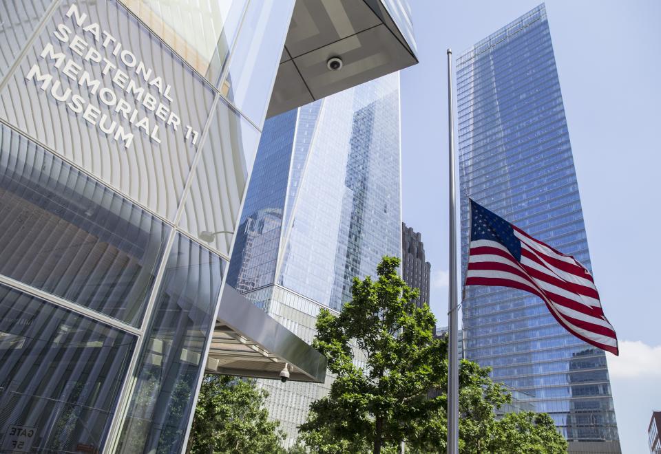 The American flag flies in front of the National September 11 Memorial & Museum
